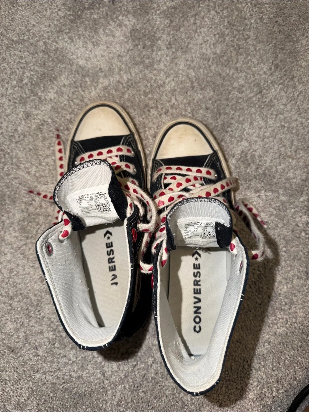 Converse Black High-Top Sneakers with Red Heart Laces